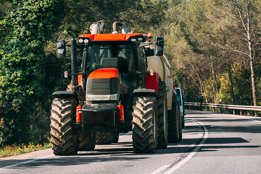 Agriculture Tags Divirsified Tag and Title image of tractor on the road.