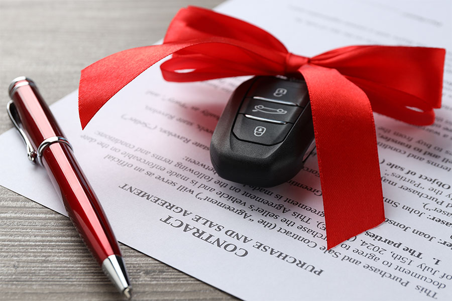 Tag and Title image of a car keys with a bow indicating a gift.